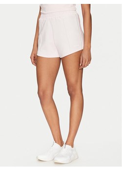 Guess Szorty sportowe V5GD14 KCRU2 Różowy Relaxed Fit ze sklepu MODIVO w kategorii Szorty - zdjęcie 182744973
