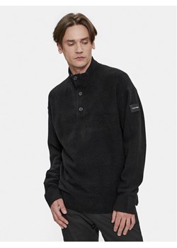 Calvin Klein Sweter K10K111960 Czarny Regular Fit ze sklepu MODIVO w kategorii Swetry męskie - zdjęcie 182747171