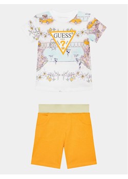 Guess Komplet t-shirt i spodenki N4GG00 K8HM3 Pomarańczowy Regular Fit ze sklepu MODIVO w kategorii Komplety chłopięce - zdjęcie 182747333