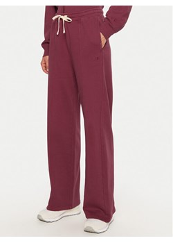 Champion Spodnie dresowe 117638 Czerwony Wide Leg ze sklepu MODIVO w kategorii Spodnie damskie - zdjęcie 182748912