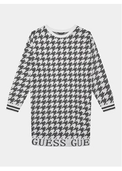 Guess Sukienka dzianinowa J3BK04 Z3AH0 Biały Regular Fit ze sklepu MODIVO w kategorii Sukienki dziewczęce - zdjęcie 182749434