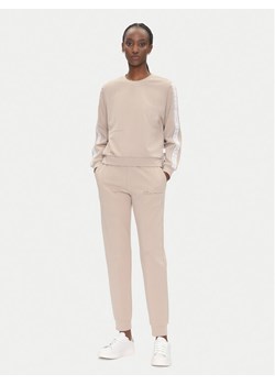 EA7 Emporio Armani Dres 7W000283 AF12501 U6155 Beżowy Regular Fit ze sklepu MODIVO w kategorii Dresy damskie - zdjęcie 182749573