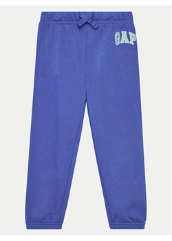 Gap Spodnie dresowe 725227-03 Niebieski Regular Fit ze sklepu MODIVO w kategorii Spodnie chłopięce - zdjęcie 182749711