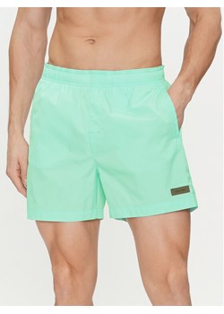 Calvin Klein Swimwear Szorty kąpielowe KM0KM00939 Niebieski Regular Fit ze sklepu MODIVO w kategorii Kąpielówki - zdjęcie 182749712