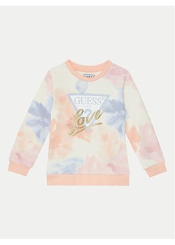 Guess Bluza K5RQ01 KA6R4 Różowy Regular Fit ze sklepu MODIVO w kategorii Bluzy dziewczęce - zdjęcie 182750533