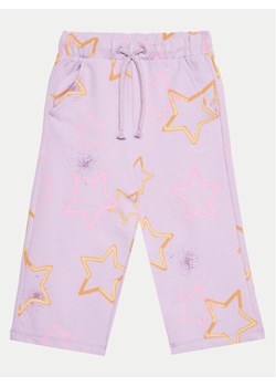 United Colors Of Benetton Spodnie dresowe 39T6GF040 Fioletowy Relaxed Fit ze sklepu MODIVO w kategorii Spodnie dziewczęce - zdjęcie 182750552