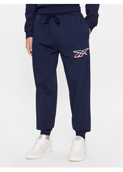 Reebok Spodnie dresowe Identity IN1685 Granatowy Regular Fit ze sklepu MODIVO w kategorii Spodnie męskie - zdjęcie 182750570