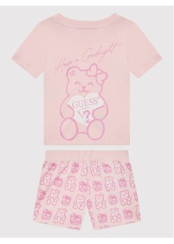 Guess Piżama H1BT07 K8HM0 Różowy Regular Fit ze sklepu MODIVO w kategorii Piżamy dziecięce - zdjęcie 182751380