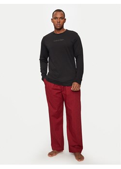 Calvin Klein Underwear Spodnie piżamowe 000NM2781E Czerwony Relaxed Fit ze sklepu MODIVO w kategorii Piżamy męskie - zdjęcie 182752322