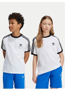 adidas T-Shirt 3-Stripes JE0515 Biały Regular Fit ze sklepu MODIVO w kategorii Bluzki dziewczęce - zdjęcie 182752473