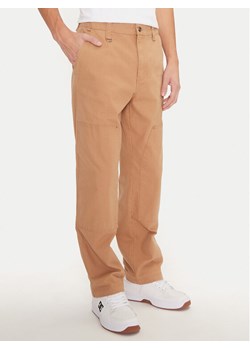 Champion Spodnie materiałowe 220506 Beżowy Straight Leg ze sklepu MODIVO w kategorii Spodnie męskie - zdjęcie 182753024
