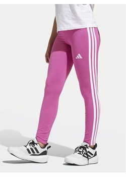 adidas Legginsy Essentials JJ3450 Różowy Slim Fit ze sklepu MODIVO w kategorii Spodnie dziewczęce - zdjęcie 182753561