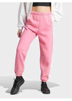 adidas Spodnie dresowe ALL SZN Fleece Washed IK4257 Różowy Loose Fit ze sklepu MODIVO w kategorii Spodnie damskie - zdjęcie 182753800