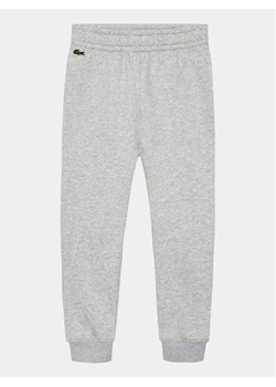 Lacoste Spodnie dresowe XJ9728 Szary Regular Fit ze sklepu MODIVO w kategorii Spodnie chłopięce - zdjęcie 182754021