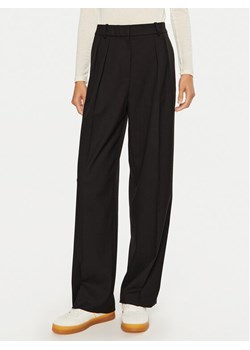 Tommy Hilfiger Spodnie materiałowe WW0WW39725 Czarny Relaxed Fit ze sklepu MODIVO w kategorii Spodnie damskie - zdjęcie 182754521