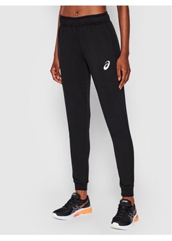 Asics Spodnie dresowe Big Logo 2032A982 Czarny Regular Fit ze sklepu MODIVO w kategorii Spodnie damskie - zdjęcie 182755220