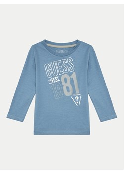 Guess Bluzka N4BI18 I3Z14 Niebieski Regular Fit ze sklepu MODIVO w kategorii Bluzki dziewczęce - zdjęcie 182756163