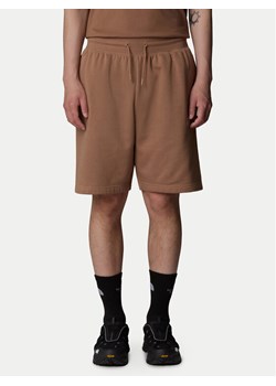 The North Face Szorty sportowe Essential NF0A8C2G Brązowy Loose Fit ze sklepu MODIVO w kategorii Spodenki męskie - zdjęcie 182757344