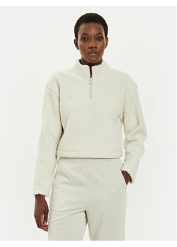Calvin Klein Performance Bluza 00GWF4W307 Beżowy Regular Fit ze sklepu MODIVO w kategorii Bluzy damskie - zdjęcie 182758981
