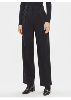 Tommy Hilfiger Spodnie materiałowe Core WW0WW39725 Granatowy Relaxed Fit ze sklepu MODIVO w kategorii Spodnie damskie - zdjęcie 182759480