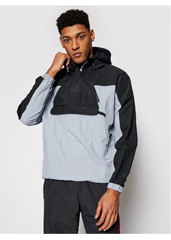 adidas Kurtka anorak Adventure Mishmash Blocked GN2329 Czarny Regular Fit ze sklepu MODIVO w kategorii Kurtki męskie - zdjęcie 182759643