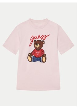 Guess T-Shirt H4BJ06 I3Z14 Różowy Regular Fit ze sklepu MODIVO w kategorii Bluzki dziewczęce - zdjęcie 182760831