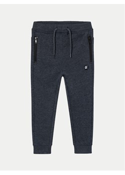 NAME IT Spodnie dresowe 13220380 Granatowy Regular Fit ze sklepu MODIVO w kategorii Spodnie chłopięce - zdjęcie 182761003