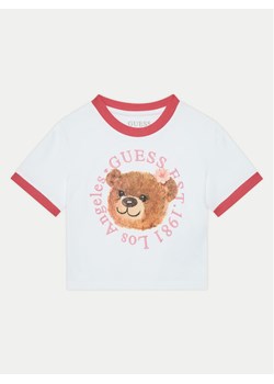 Guess T-Shirt J5RI41 K6YW4 Biały Regular Fit ze sklepu MODIVO w kategorii Bluzki dziewczęce - zdjęcie 182761473