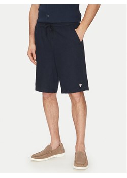 Guess Szorty materiałowe F5GD00 WH4J0 Granatowy Regular Fit - id: 0000304845895 - marki Guess - 182761963 Guess Szorty materiałowe F5GD00 WH4J0 Granatowy Regular Fit ze sklepu MODIVO w kategorii Spodenki męskie - zdjęcie 182761963