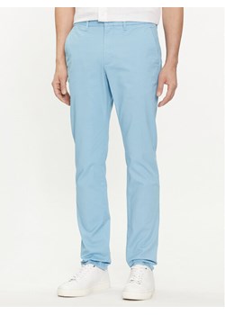 Tommy Hilfiger Chinosy Bleecker MW0MW26619 Błękitny Slim Fit ze sklepu MODIVO w kategorii Spodnie męskie - zdjęcie 182762054