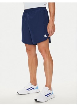 adidas Szorty sportowe Run It IN0088 Niebieski Regular Fit ze sklepu MODIVO w kategorii Spodenki męskie - zdjęcie 182762812