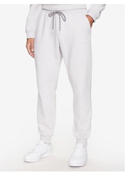 Columbia Spodnie dresowe Marble Canyon™ Heavyweight Fleece Pant Szary Regular Fit ze sklepu MODIVO w kategorii Spodnie męskie - zdjęcie 182763602