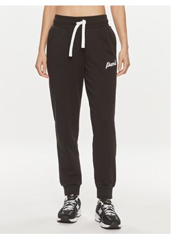 Puma Spodnie dresowe Ess+ Script 679350 Czarny Regular Fit ze sklepu MODIVO w kategorii Spodnie damskie - zdjęcie 182763961