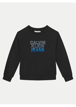 Calvin Klein Jeans Bluza IB0IB02376 Czarny Relaxed Fit ze sklepu MODIVO w kategorii Bluzy chłopięce - zdjęcie 182764513