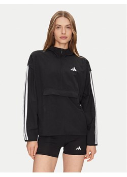 adidas Wiatrówka Essentials 3-Stripes JE1312 Czarny Regular Fit ze sklepu MODIVO w kategorii Kurtki damskie - zdjęcie 182764834