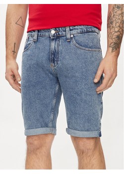 Tommy Jeans Szorty jeansowe Ronnie DM0DM19155 Niebieski Slim Fit ze sklepu MODIVO w kategorii Spodenki męskie - zdjęcie 182765351