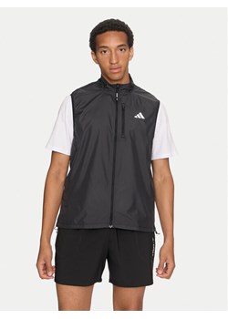 adidas Kamizelka Own the Run IN1493 Czarny Slim Fit ze sklepu MODIVO w kategorii Kamizelki męskie - zdjęcie 182765420
