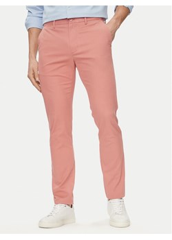Tommy Hilfiger Chinosy Bleecker MW0MW26619 Różowy Slim Fit ze sklepu MODIVO w kategorii Spodnie męskie - zdjęcie 182766094