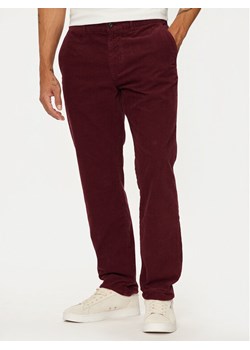 Tommy Hilfiger Spodnie materiałowe MW0MW32932 Bordowy Regular Fit ze sklepu MODIVO w kategorii Spodnie męskie - zdjęcie 182766304