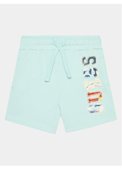 Guess Szorty sportowe N4GD04 KA6R3 Niebieski Relaxed Fit ze sklepu MODIVO w kategorii Spodenki chłopięce - zdjęcie 182766892