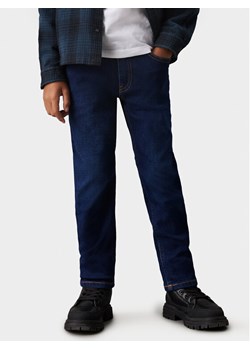 Calvin Klein Jeans Jeansy Authentic IB0IB02188 Granatowy Regular Fit ze sklepu MODIVO w kategorii Spodnie chłopięce - zdjęcie 182767052