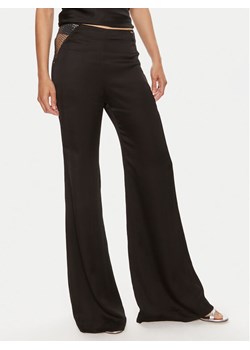 ROTATE Spodnie materiałowe Malou 112538100 Czarny Slim Fit ze sklepu MODIVO w kategorii Spodnie damskie - zdjęcie 182767831