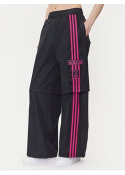 adidas Spodnie dresowe Adibreak JD0088 Czarny Regular Fit ze sklepu MODIVO w kategorii Spodnie damskie - zdjęcie 183578214