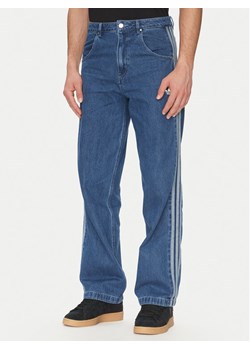 adidas Jeansy adicolor Denim Firebird JC6234 Niebieski Straight Fit ze sklepu MODIVO w kategorii Jeansy męskie - zdjęcie 183578243