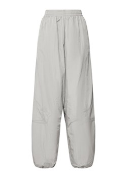 adidas Spodnie dresowe adicolor Teamgeist JD0258 Szary Oversize ze sklepu MODIVO w kategorii Spodnie damskie - zdjęcie 183578493