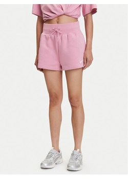 Nike Szorty sportowe Phoenix FD1409 Różowy Regular Fit ze sklepu MODIVO w kategorii Szorty - zdjęcie 183595714