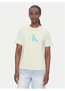Calvin Klein Jeans T-Shirt Hero LV047B865G Beżowy Regular Fit ze sklepu MODIVO w kategorii Bluzki damskie - zdjęcie 183597524