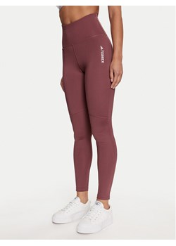 adidas Legginsy Terrex Multi IP6882 Różowy Slim Fit ze sklepu MODIVO w kategorii Spodnie damskie - zdjęcie 183602242