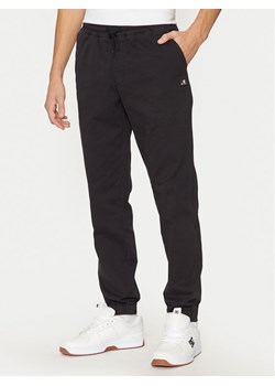 Champion Joggery 220518 Czarny Regular Fit - id: 0000304700422 - marki Champion - 183620210 Champion Joggery 220518 Czarny Regular Fit ze sklepu MODIVO w kategorii Spodnie męskie - zdjęcie 183620210
