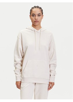 Puma Bluza Her 685057 Beżowy Relaxed Fit ze sklepu MODIVO w kategorii Bluzy damskie - zdjęcie 183652283